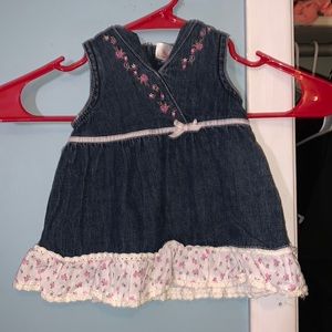 Blue Jean dress with white frill at the bottom with cute pink flower designs